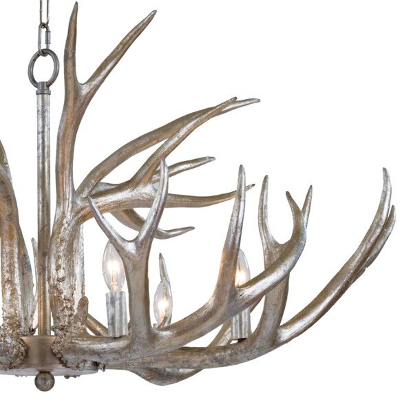 Ambered silver leaf antlers of an antler chandelier
